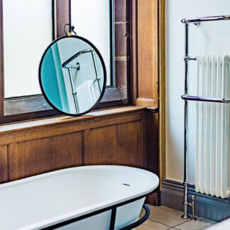 Period style bathroom radiator in edwardian country house