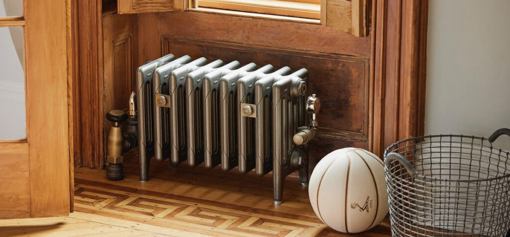 Steam radiator with TRV temperature controls in Brooklyn brownstone home