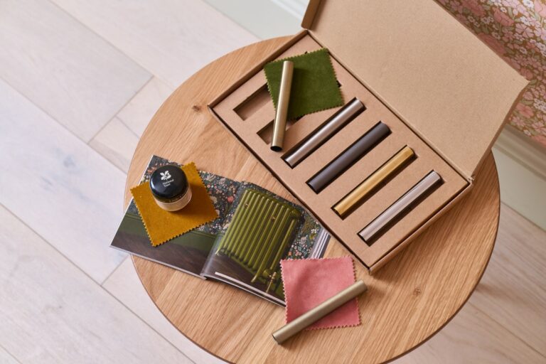 Brassware samples for cast iron radiator valves and pipe shrouds with Little Greene paint tester pot